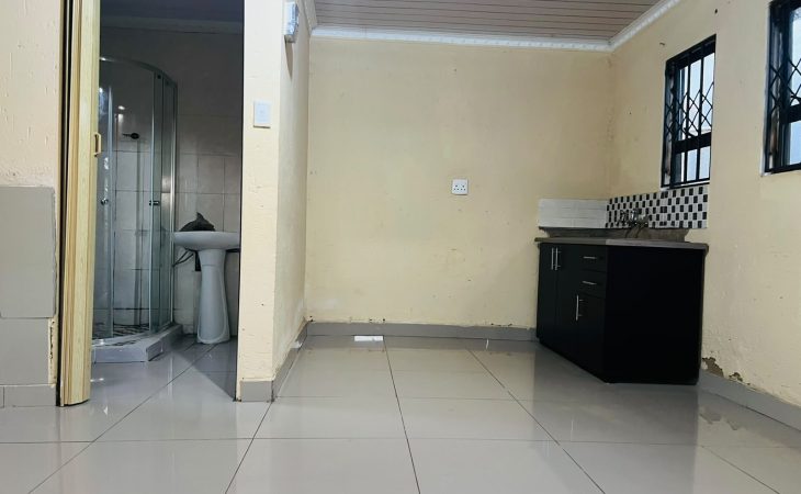 Garage size bachelor room to rent in Protea Glen Ext 24, Soweto with kitchenette, open-plan layout and private ensuite bathroom